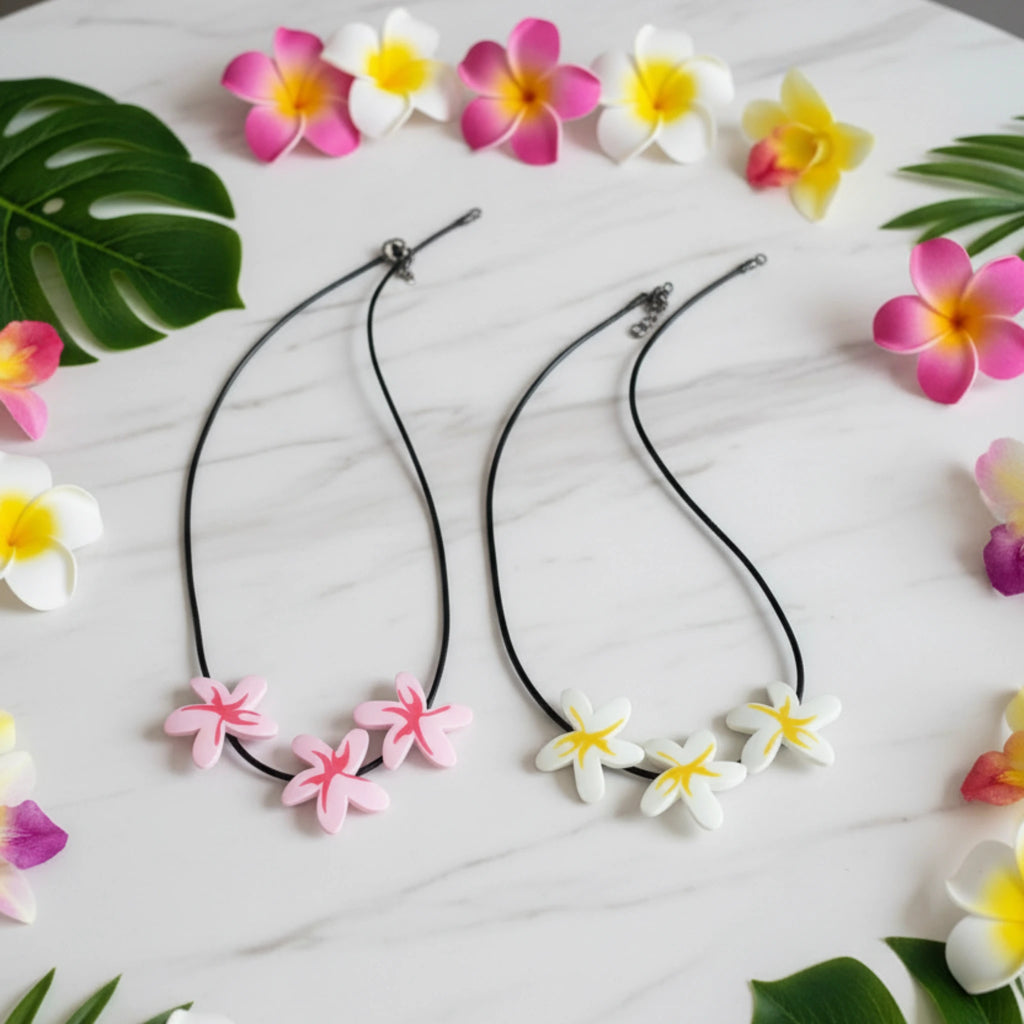 Collier choker vintage Rip Curl fleurs de tiaré rose pâle et fuchsia – style surf Y2K