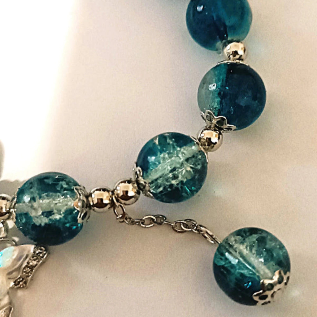 Bracelet "Envol de Turquoise" – Éclat Cristallin et Papillons