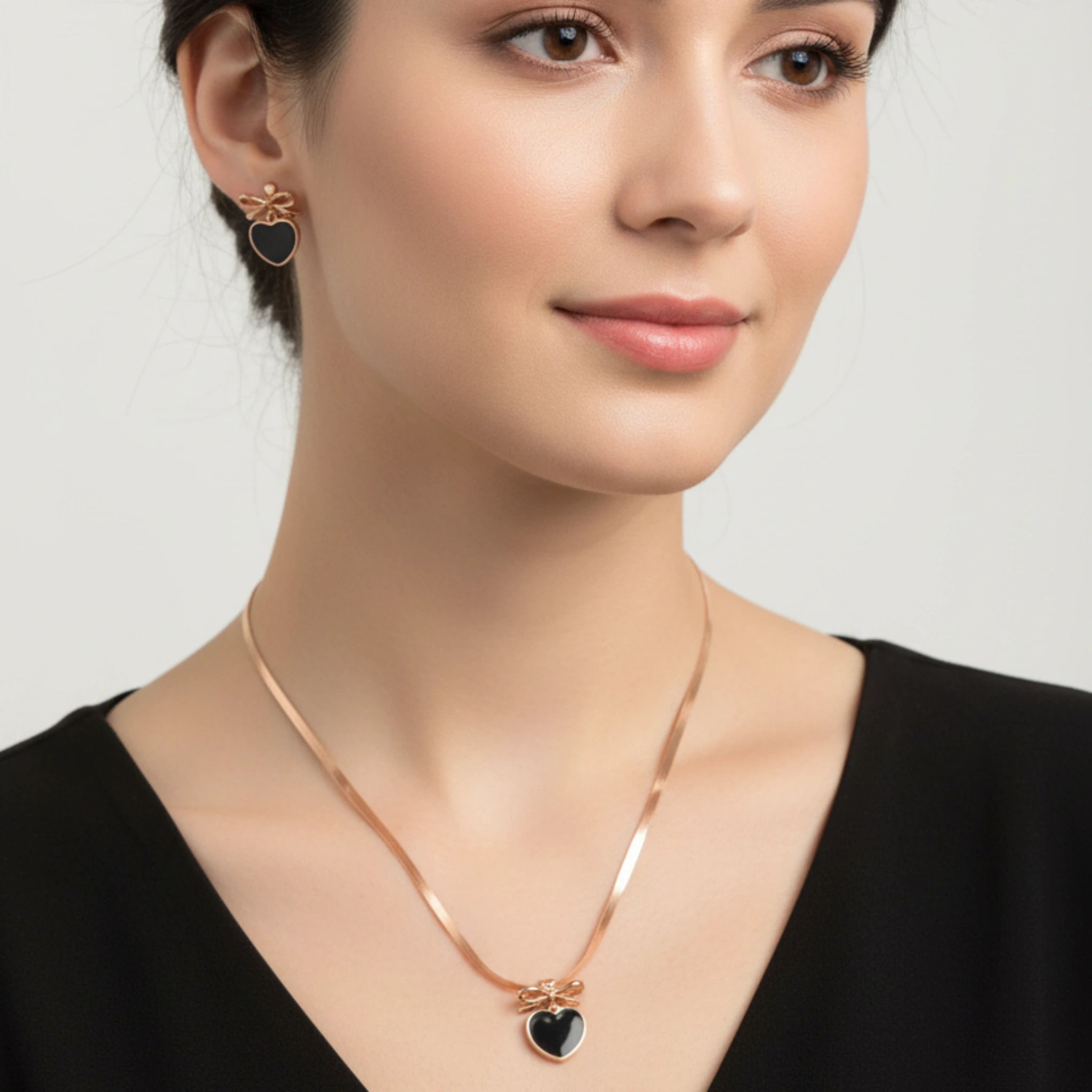 Parure "Cœur Nœud Noir ou Blanc" – Élégance & Confort Acier